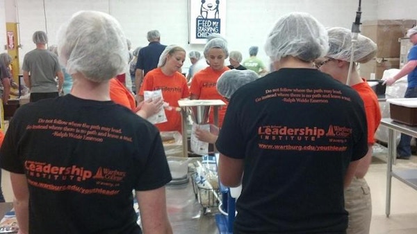 Leading By Serving With Feed My Starving Children T-Shirt Photo